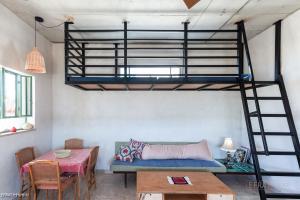 Voodi või voodid majutusasutuse בקתה וטבילה במדבר toas