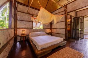Ένα ή περισσότερα κρεβάτια σε δωμάτιο στο The Forest Elephant - Formerly known as the Flying Elephant