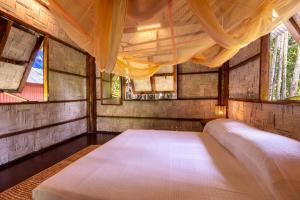 Ένα ή περισσότερα κρεβάτια σε δωμάτιο στο The Forest Elephant - Formerly known as the Flying Elephant +41 φωτογραφίες