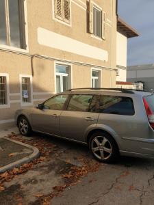a silver car parked in front of a building at Da zia Fabri in Gorizia +3 photos