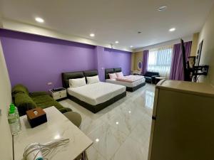 Ένα ή περισσότερα κρεβάτια σε δωμάτιο στο 草莓驛站