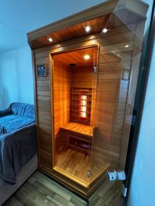 Ένα ή περισσότερα κρεβάτια σε δωμάτιο στο Apartment Kovářská, view of Klínovec