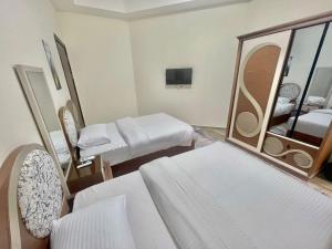 Ένα ή περισσότερα κρεβάτια σε δωμάτιο στο Golden Sweet house Latina +5 φωτογραφίες