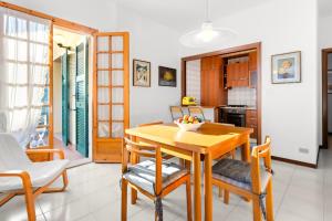 Køkken eller tekøkken på Hostdomus - Oasi Apartment free garage