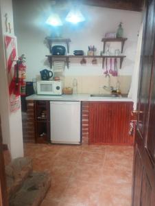 Kuchyň nebo kuchyňský kout v ubytování La Pirquita