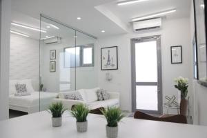 Ένα ή περισσότερα κρεβάτια σε δωμάτιο στο Luxe Condado Condo Terrace