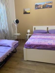 Ένα ή περισσότερα κρεβάτια σε δωμάτιο στο Good vibe room