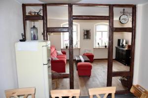 Posezení v ubytování Ferienhaus Schäwisch + 23 fotografií