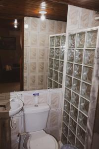 Ένα μπάνιο στο Coruja Suites - Ilha Grande