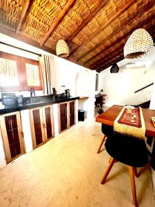 Kuchyň nebo kuchyňský kout v ubytování Alto Mar - Atins