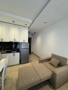 Kuchyň nebo kuchyňský kout v ubytování Shengjin apartaments