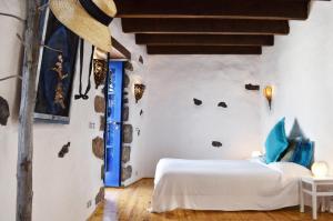 Voodi või voodid majutusasutuse Lavastein Bauernhaus Yazmina Mit Schönem Garten toas