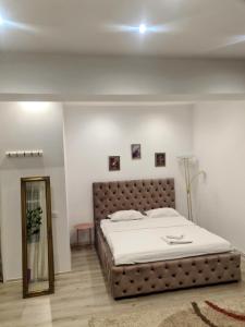 Postel nebo postele na pokoji v ubytování Elena Residence