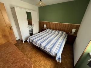 Postel nebo postele na pokoji v ubytování Casa Ognano (Pellizzano)