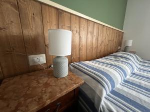 Postel nebo postele na pokoji v ubytování Casa Ognano (Pellizzano) + 12 fotografií