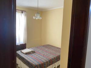 Postel nebo postele na pokoji v ubytování Casa en zona centro