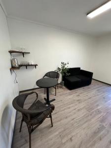 Posezení v ubytování Angol Suite + 2 fotografie