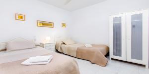 Postel nebo postele na pokoji v ubytování Apto B-A almoraide suites