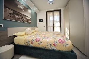 Ένα ή περισσότερα κρεβάτια σε δωμάτιο στο La Dimora di Gea