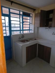 Η κουζίνα ή μικρή κουζίνα στο The Joseph Sport Property