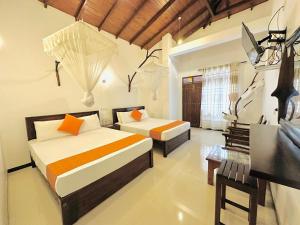 Voodi või voodid majutusasutuse Ora Safari Resort toas