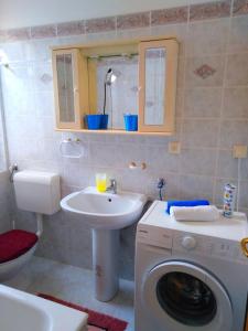 Ένα μπάνιο στο Apartments Vesna