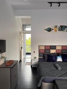 Posezení v ubytování Casa Oceanus - Pool Facing Room - Ganpatipule