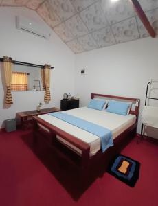 Ένα ή περισσότερα κρεβάτια σε δωμάτιο στο Turtle Island Cabana