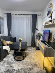 TV a/nebo společenská místnost v ubytování Bukoto