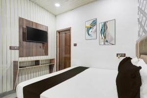 Imagem da galeria de Hotel O Heaven Stay em Nova Deli mais 21 fotografias