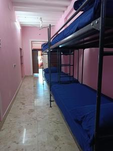 Ένα ή περισσότερα κρεβάτια σε δωμάτιο στο Le Apex Hostel +5 φωτογραφίες