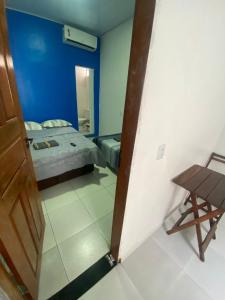 En eller flere senge i et værelse på AeroBelém - Apart & Residence