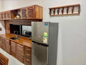 Η κουζίνα ή μικρή κουζίνα στο Mnazi Dream House