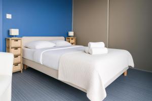 Postel nebo postele na pokoji v ubytování spacieux appartement - vue sur chenal - 6 personnes