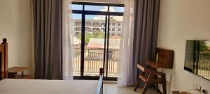 Ένα ή περισσότερα κρεβάτια σε δωμάτιο στο Mnazi Dream House