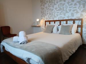 Postel nebo postele na pokoji v ubytování Maison Gohora Dago