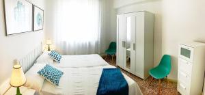 Voodi või voodid majutusasutuse Helle Wohnung In Castiglione Della Pescaia toas