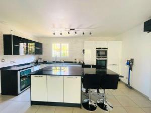 Kuchyň nebo kuchyňský kout v ubytování Vila Paradise