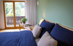 Llit o llits en una habitació de Hotel Dunza