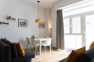 Posezení v ubytování NUEVO Apartamentos Costa del Alma + 28 fotografií