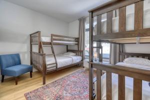 Postel nebo postele na pokoji v ubytování The Escape at Verbier - Modern Condo at Verbier Resort