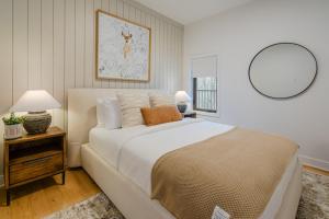 Ένα ή περισσότερα κρεβάτια σε δωμάτιο στο The Fawn Tremblant at Verbier, 3 Bedroom Retreat