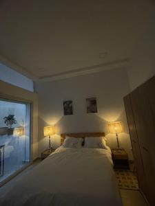 Ένα ή περισσότερα κρεβάτια σε δωμάτιο στο Blueyes +11 φωτογραφίες