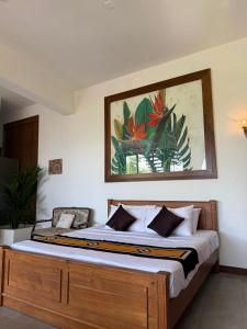 Voodi või voodid majutusasutuse Harmonie By Ayuthantra toas