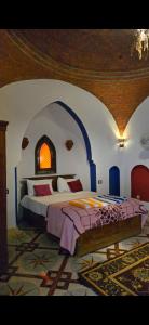 Postel nebo postele na pokoji v ubytování Leyla Eco Resort Queen Suites