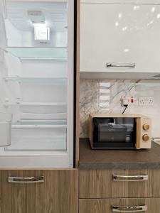 Η κουζίνα ή μικρή κουζίνα στο Travelers Nest