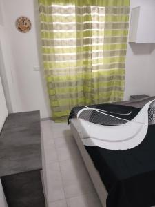 Llit o llits en una habitació de Intero appartamento - Inalpi Arena - Bea Future