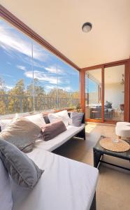 Posezení v ubytování Moderno y exclusivo depto con vista a la laguna grande