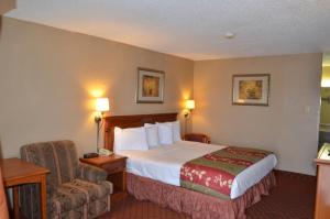 Postel nebo postele na pokoji v ubytování Americas Best Value Inn Crosstimbers