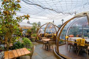 Εστιατόριο ή άλλο μέρος για φαγητό στο Posh Soho Studio Large Windows by Oxford St, Mayfair W1